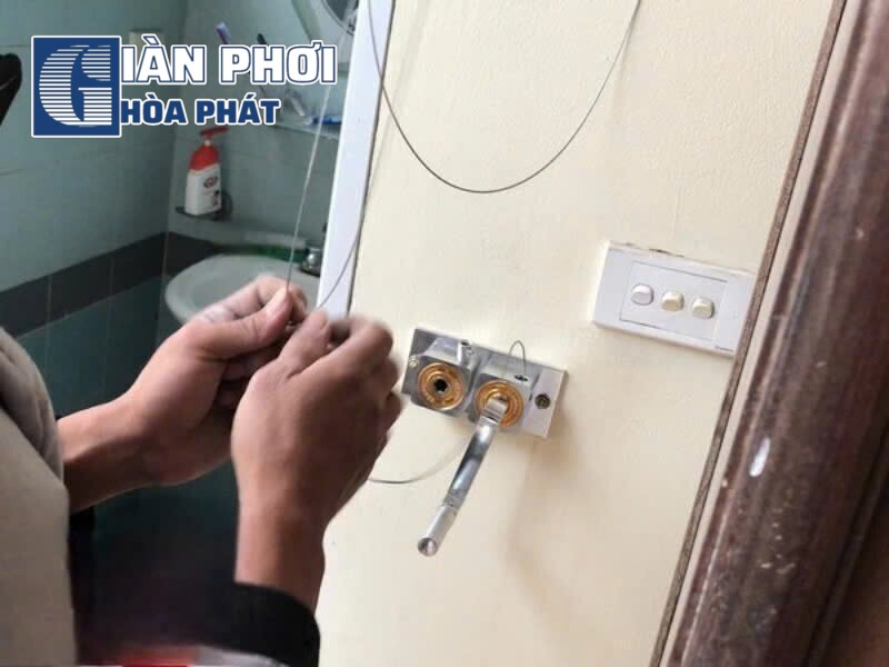 lỗi hư lò xo bộ tời giàn phơi