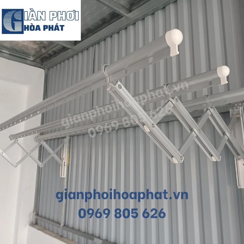 A metal rack from a wallDescription automatically generated